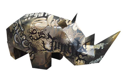 statue rhinocéros graffiti or et noir tage no rules